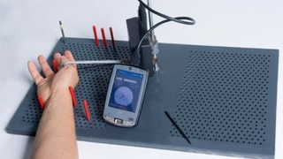 Pegboard Device Sinks Carpal Tunnel's Battleship